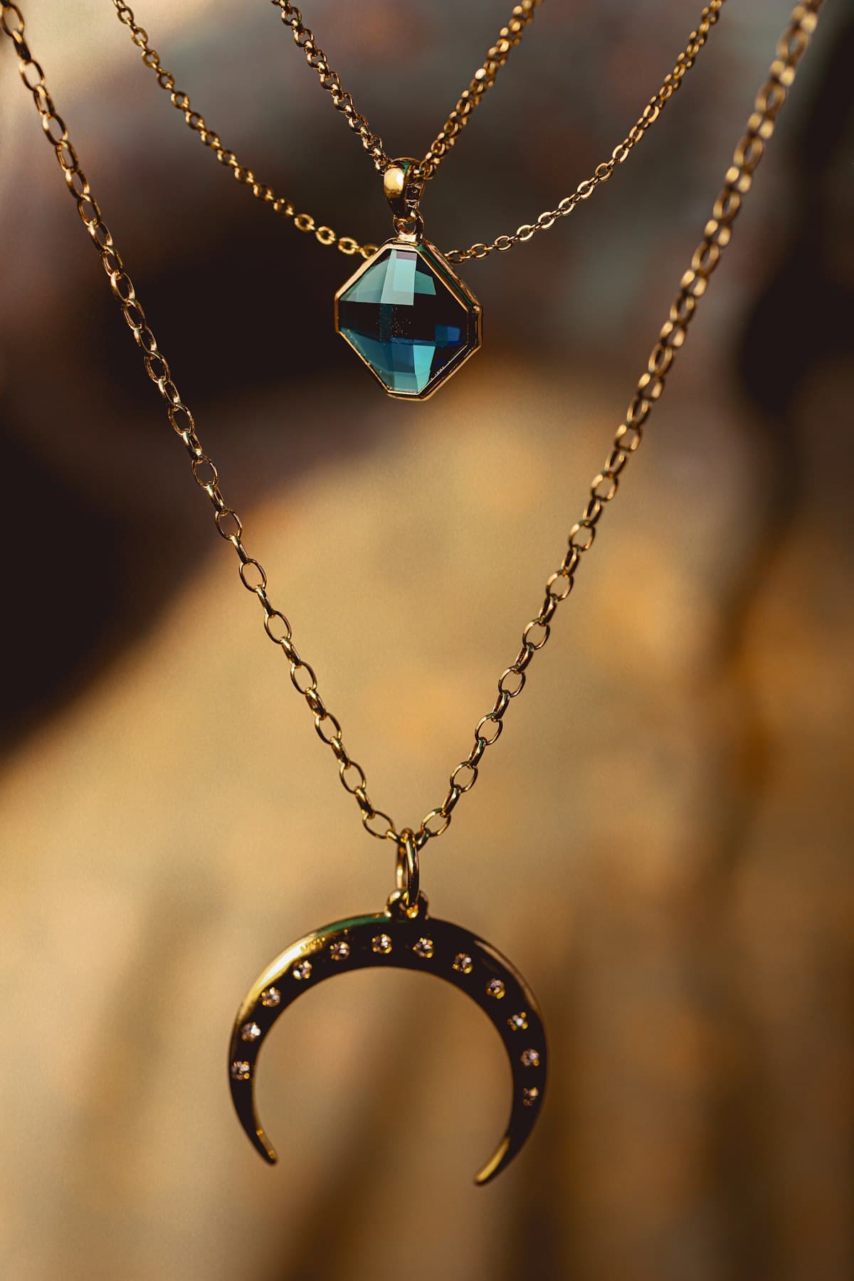 A diamond necklace being inspected and cared for